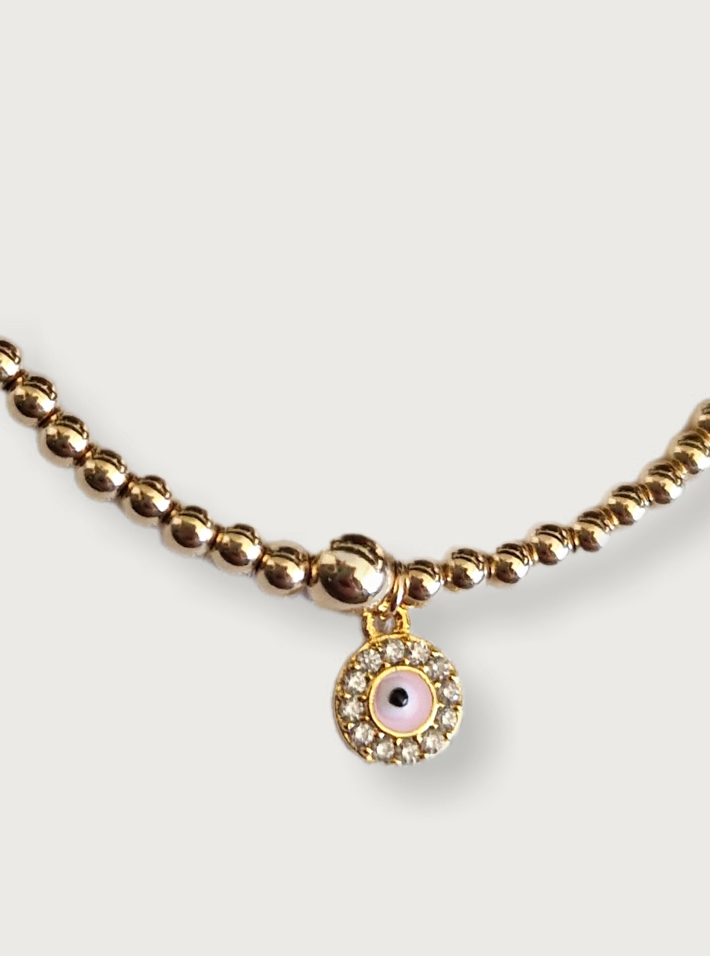 Gold Bobble Bracelet - Pink Crystal Eye
