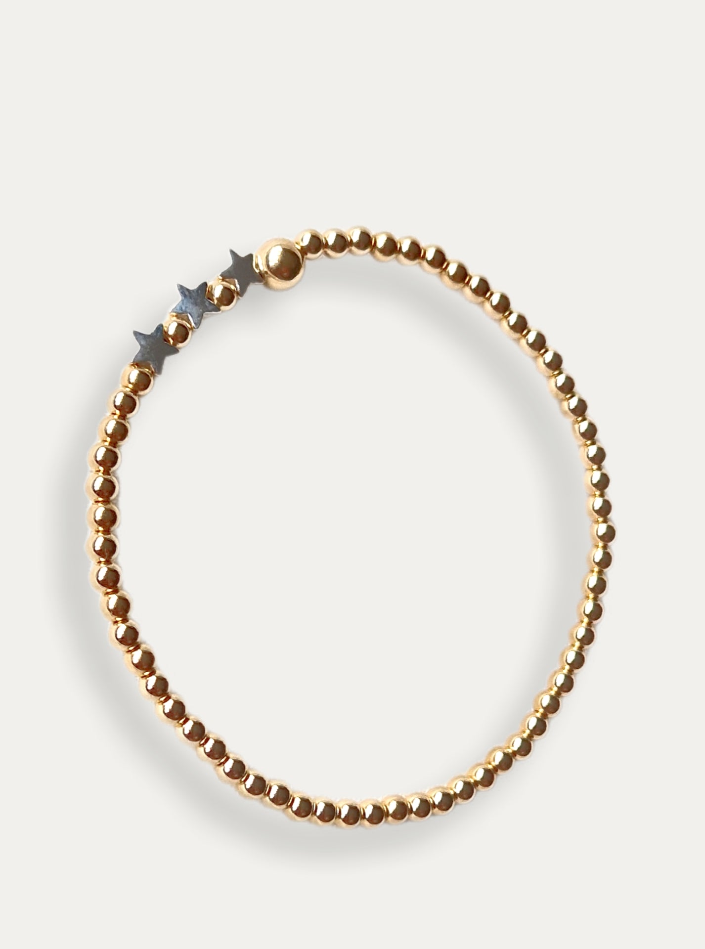 Gold Bobble Bracelet - Silver Star Beads