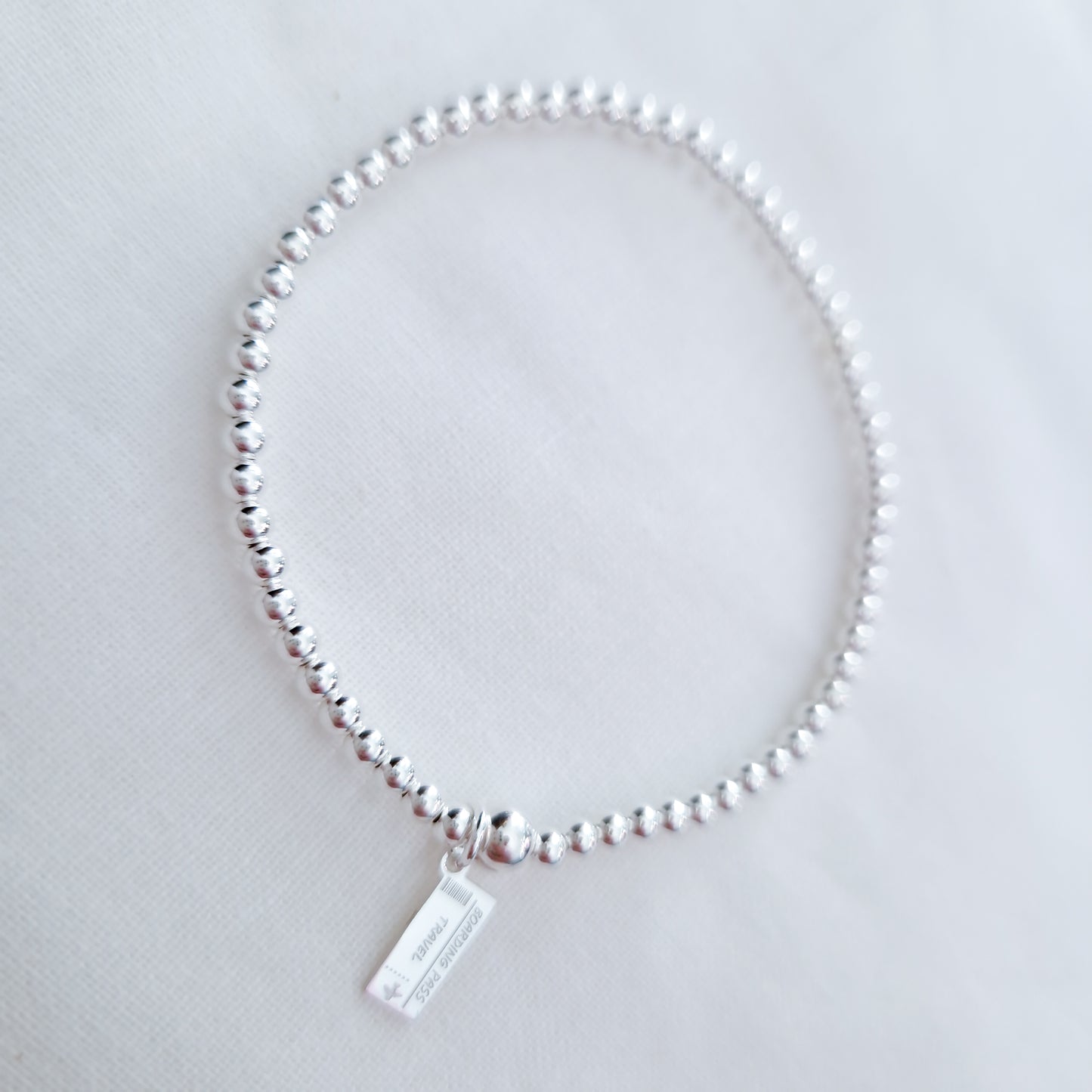 Silver Bobble Bracelet - Plane Ticket Charm