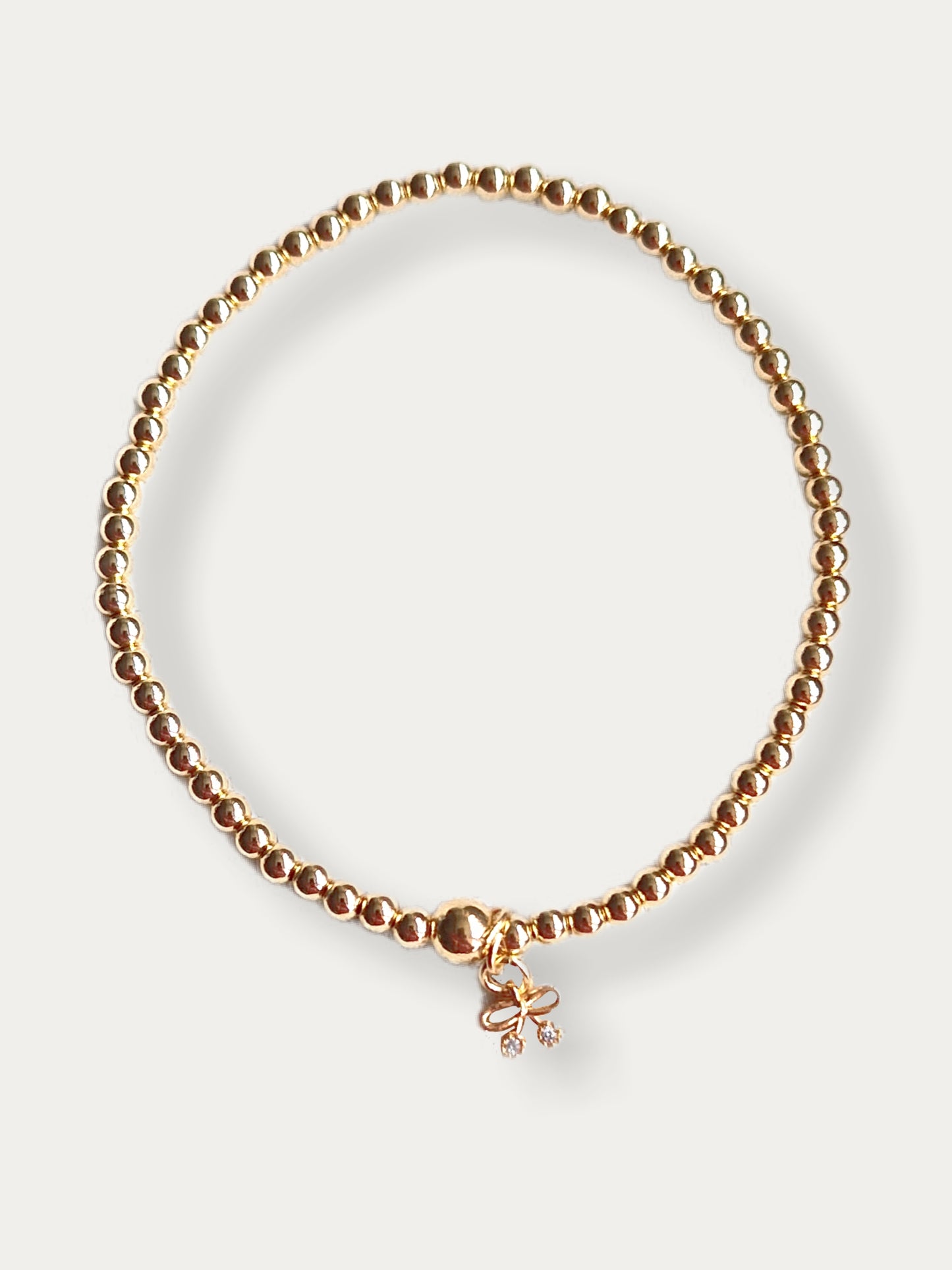 Gold Bobble Bracelet- Tiny Bow